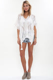 Naila Fringe Poncho Top in Bleached