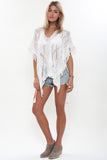 Naila Fringe Poncho Top in Bleached