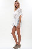 Naila Fringe Poncho Top in Bleached